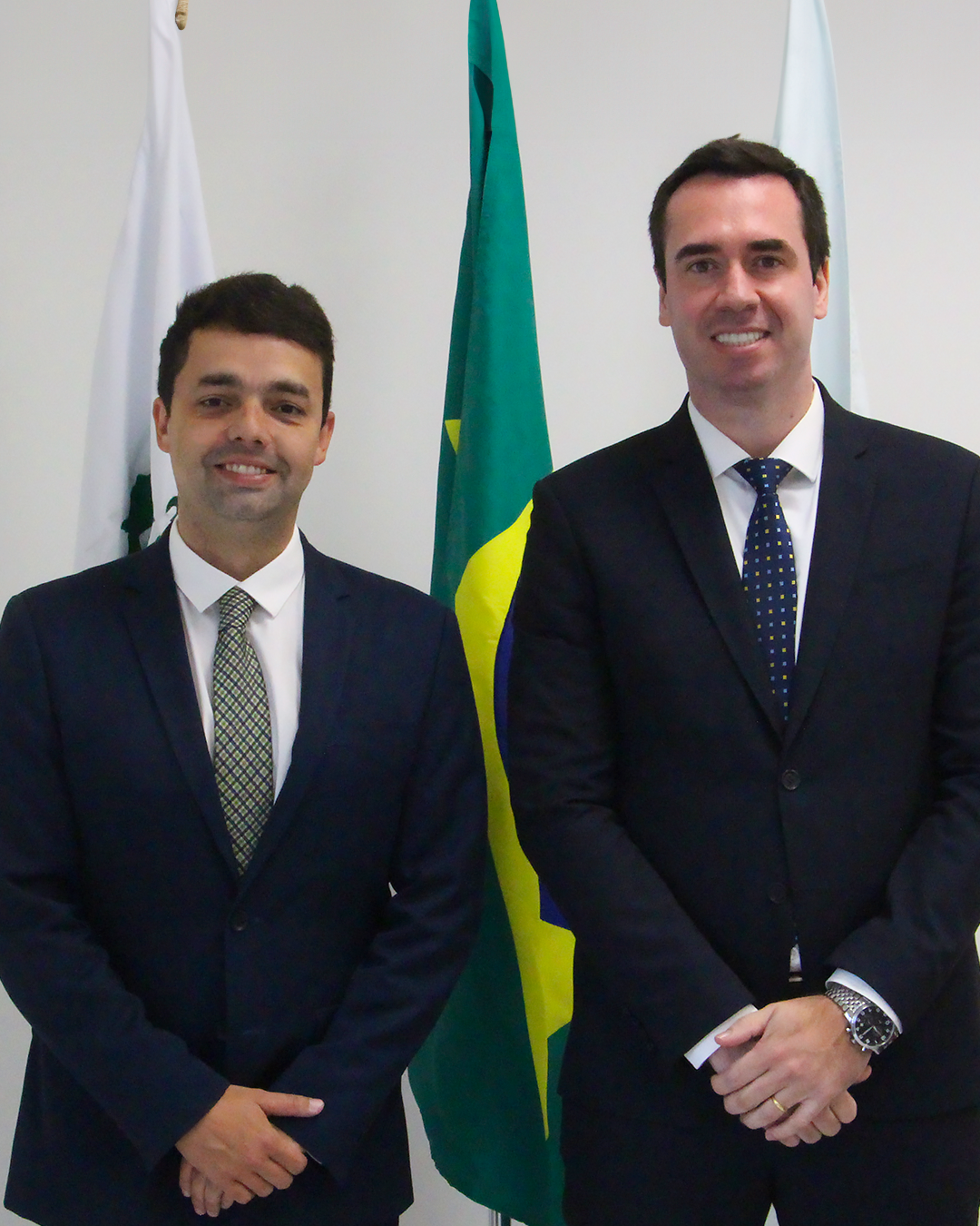Imagem com foto dos defensores públicos do Paraná André Ribeiro Giamberardino e Matheus Munhoz.