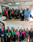 Imagem da equipe da Defensoria junto de convidados durante a inauguração da nova sede em Apucarana.