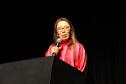 Imagem da presidenta da Associação Nacional das Defensoras e Defensores Públicos (ANADEP), Rivana Ricarte, discursando durante o evento.