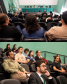 Imagem com duas fotos: em ambas, o público participante assiste à palestra do desembargador Marcelo Semer.