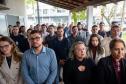 Imagem mostra o público presente na inauguração. 
