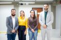 Defensores Públicos posam para foto durante Mutirão de atendimento do NUDECON para super endividados. 
