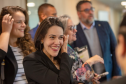 Defensora pública Mariana chega para o evento. 