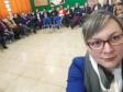 A foto consiste de um selfie tirada durante a reunião com professores. 