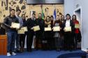 Os homenageados presentes: os Defensores Públicos Júlio César Duailibe Salem Filho e Ricardo Milbrath Padoim, o técnico administrativo Cristian de Andrade Urban, as servidoras Ana Letícia de França, Sílvia Haas Amaral e Tamima Gobbo Tuma Schrut e os estagiários Evaristo Tomazoni Neto, Paulo Rogério Carneiro, Marcal Christian Gomes dos Santos e Caroline Akemi Okida.