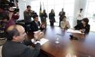 A defensora pública-geral do Estado, Josiane Lupion, 
assina convênio com a Cohapar.