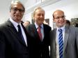 O defensor público-geral do Paraná, Sérgio Roberto Rodrigues Parigot de Souza, o presidente do STF, Ricardo Lewandowski, e o subdefensor público-geral do estado, Eduardo Abraão, durante cerimônia no TJPR.