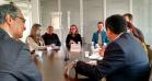 O defensor público-geral do Paraná, Sérgio Parigot de Souza (à esquerda), com o diretor do INTERPI, José Osmar Alves (à direita) e demais integrantes do ITCG, DPPR e Banco Mundial, que participaram da reunião.