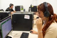 Imagem com foto da equipe de atendimento do Disque Defensoria 129.