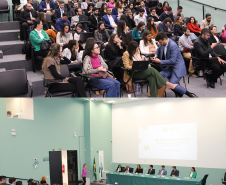 Imagem aberta mostrando o auditório todo lotado de defensores e defensoras públicas durante o evento.