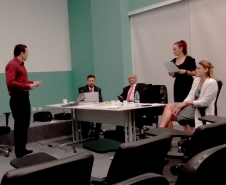Imagem com foto do curso sobre a atuação da Defensoria Pública no Tribunal do Júri.