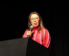 Imagem da presidenta da Associação Nacional das Defensoras e Defensores Públicos (ANADEP), Rivana Ricarte, discursando durante o evento.