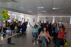 Membros, servidores e estagiários assistindo ao jogo do dia 13 de junho.